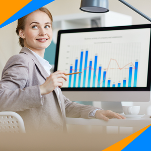 Mulher enfrente ao monitor onde estão expostsos gráficos e dados.